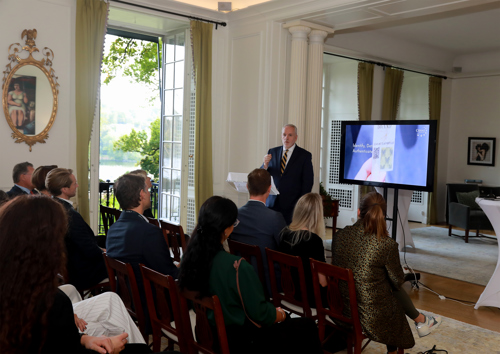 US Deputy Chief of Mission Mark Evans welcomes attendees at the US Ambassador’s Residence in Stockholm.