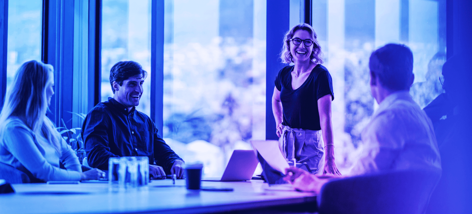 Team of authenticity specialists collaborating around a conference table at Crane Authentication