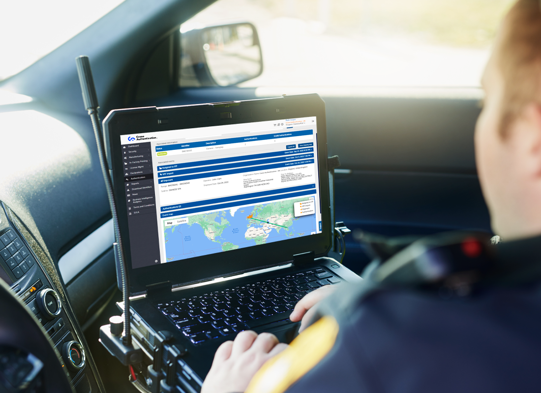 Authority figure in a vehicle reviewing SecureETag® Insight software on a laptop